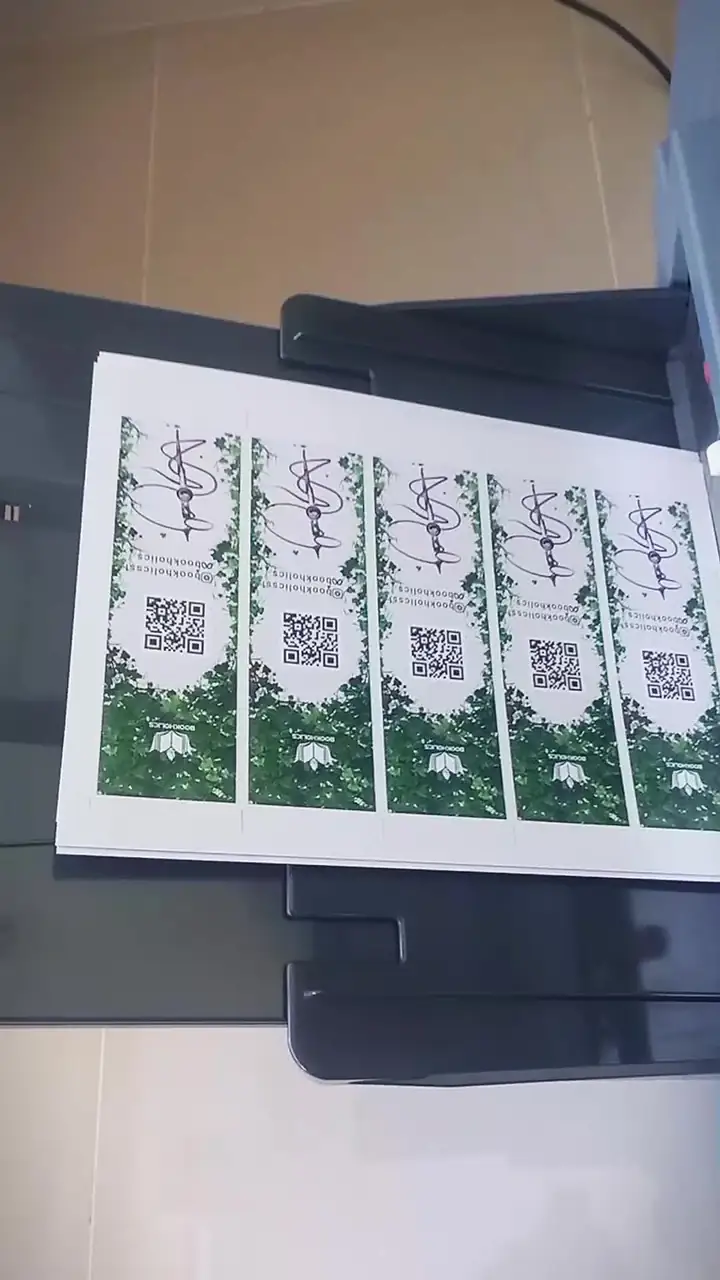 Sheet of printed bookmarks with QR codes, made for Bookholics.lk